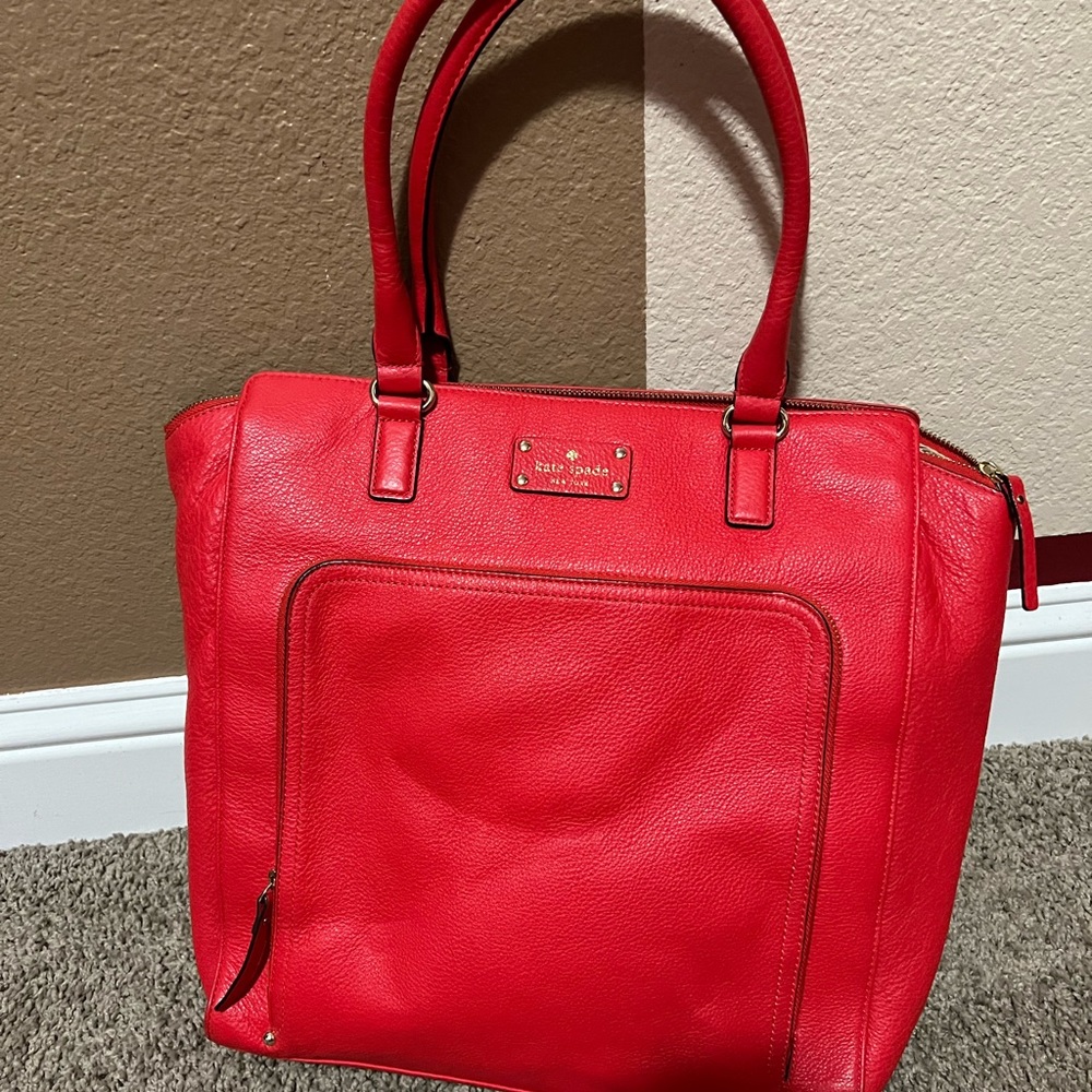 Red Kate Spade bag.